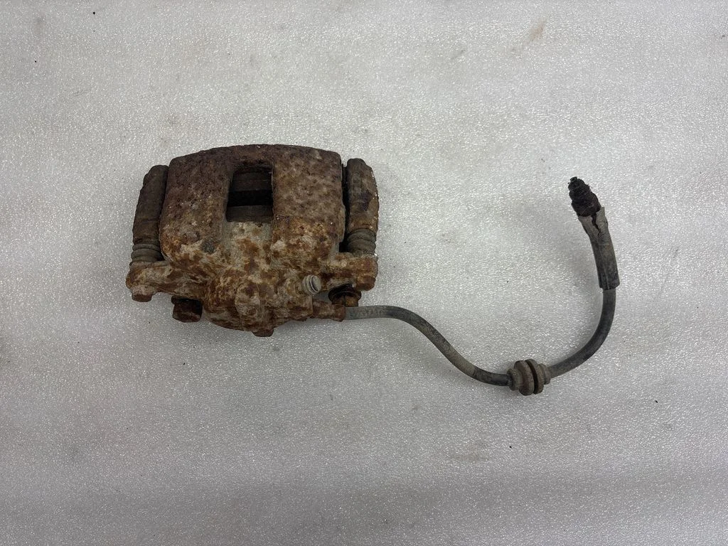 Rear brake caliper – right