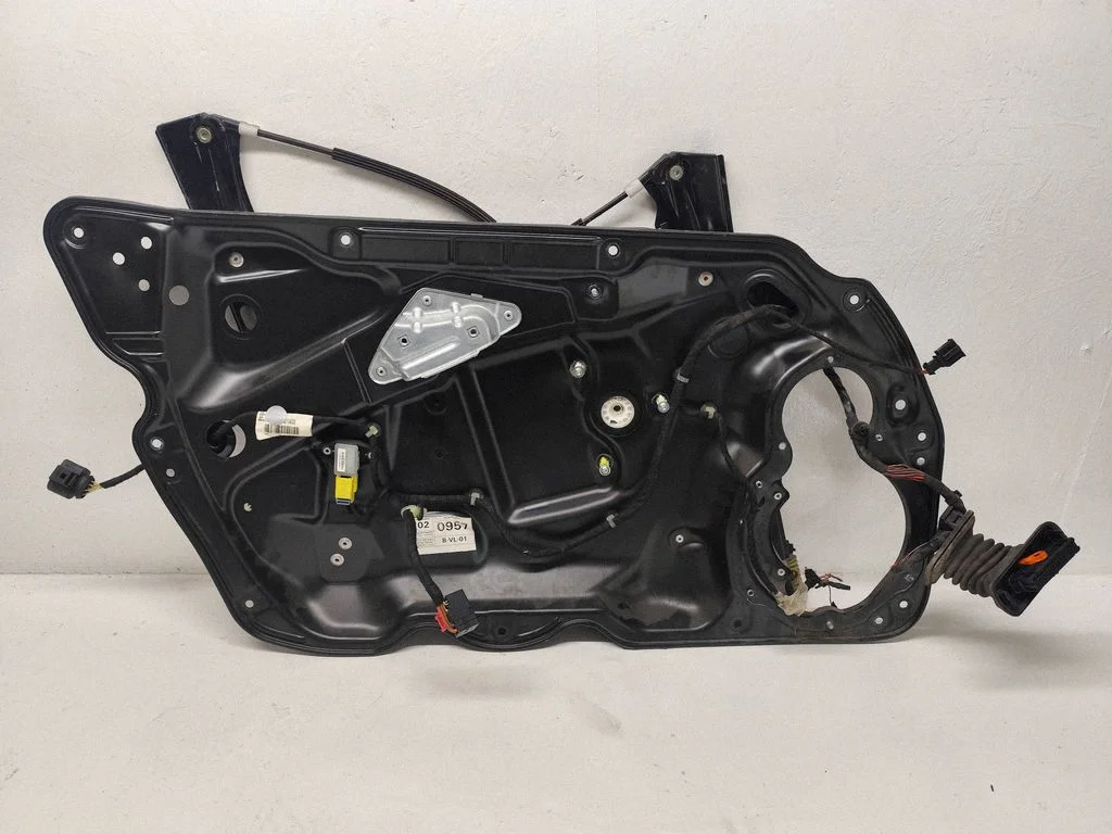 Priekšējā el. loga pacēlāja mehānisma komplekts – Volkswagen Passat B6 (2005-2010)