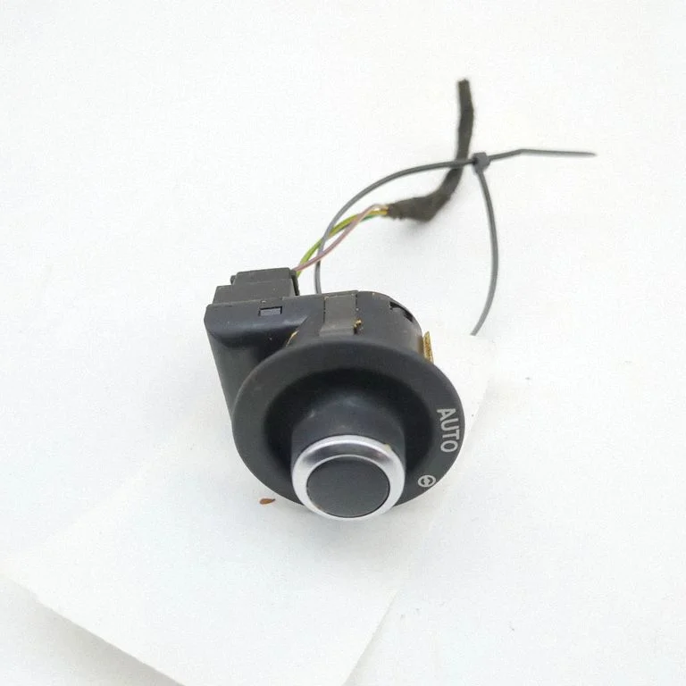Steering wheel adjustment switch FW936465AB