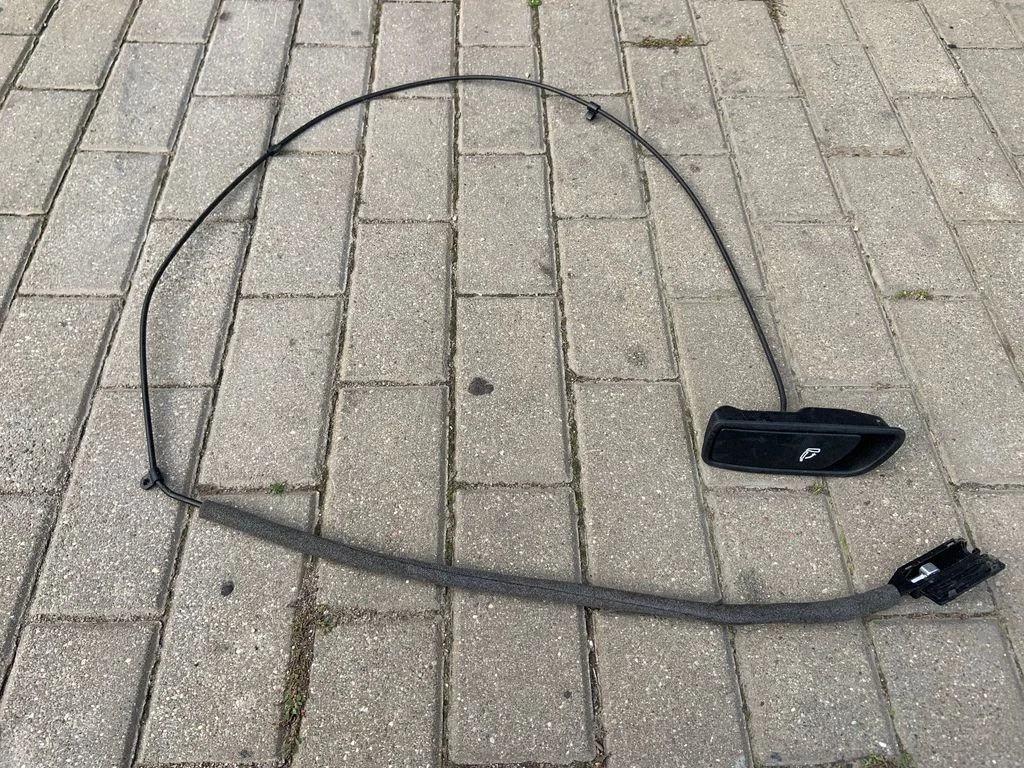 Sėdynės nugaros atramos atlenkimo rankenėlė