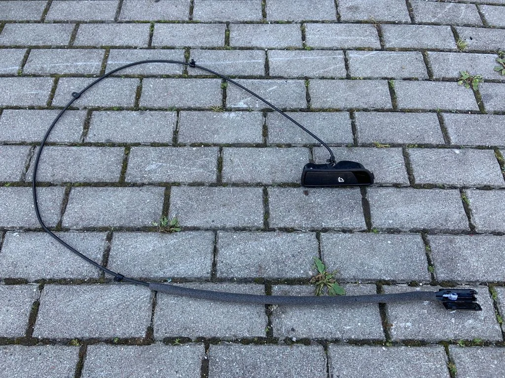Sėdynės nugaros atramos atlenkimo rankenėlė