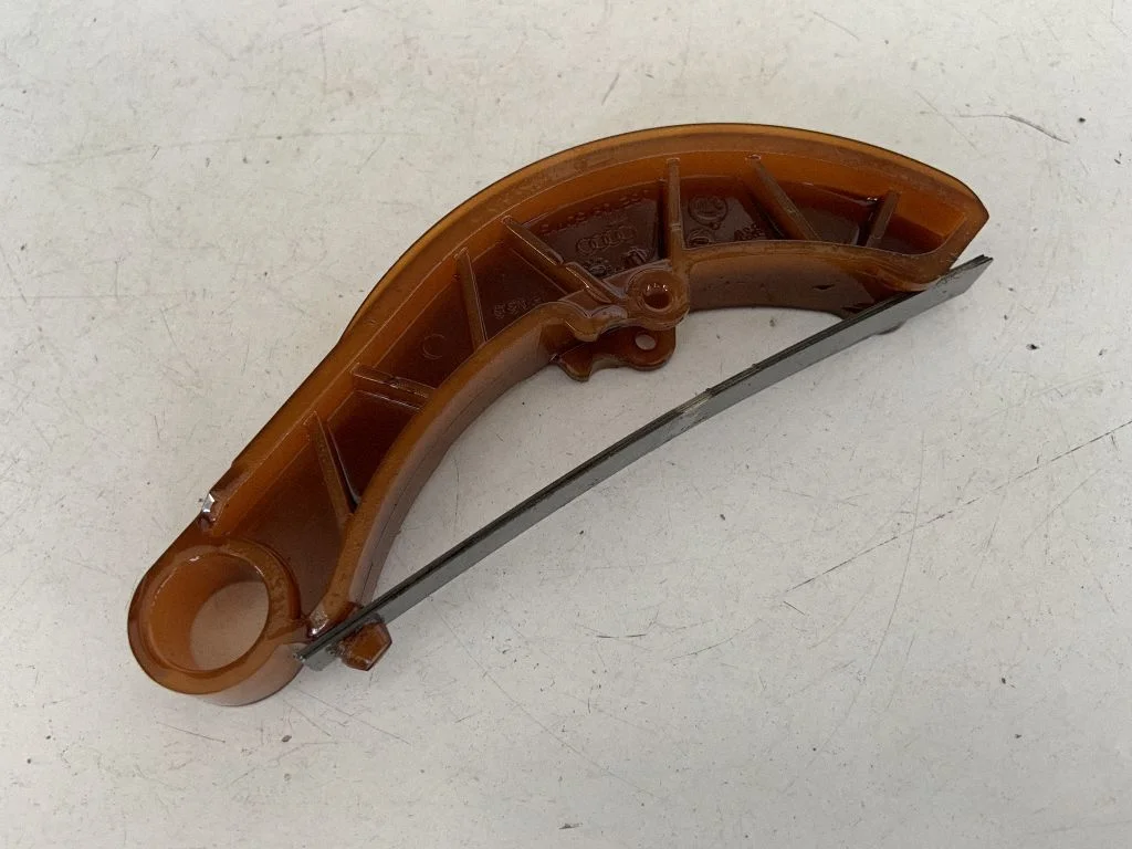 Timing belt/chain tensioner 06E109507G