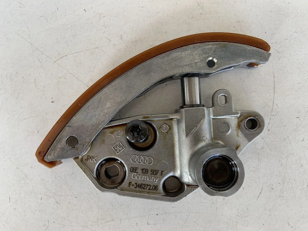 Timing belt/chain tensioner 06E109507F