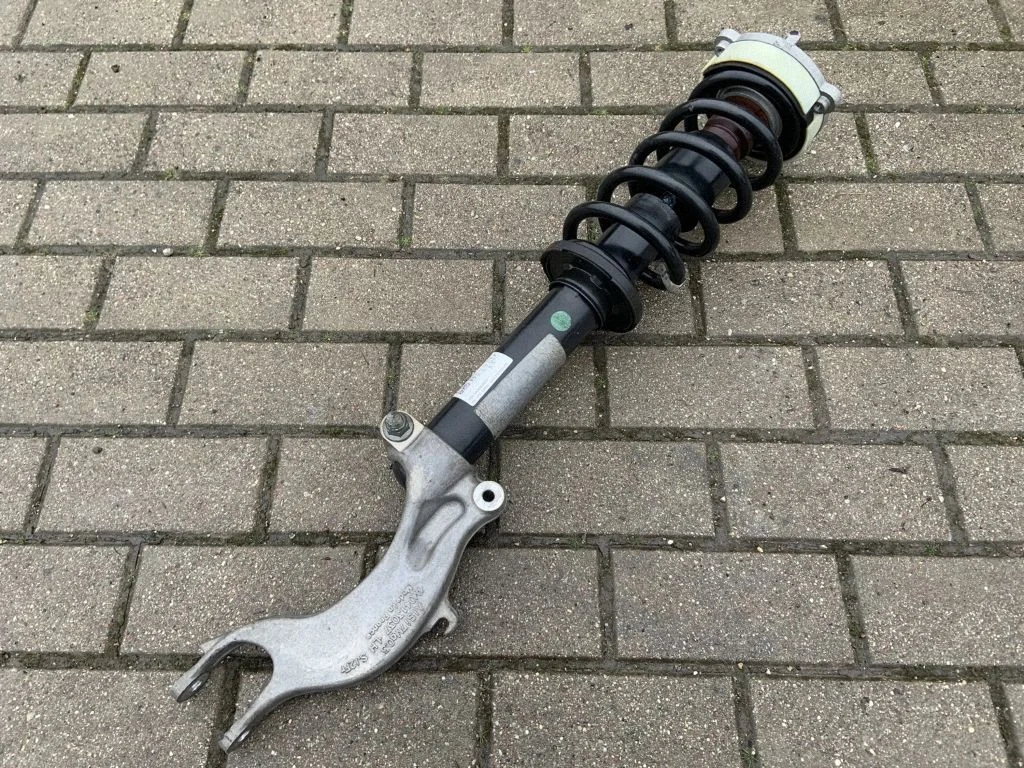 Eesmine amortisaator koos vedruga 80A413031AK
