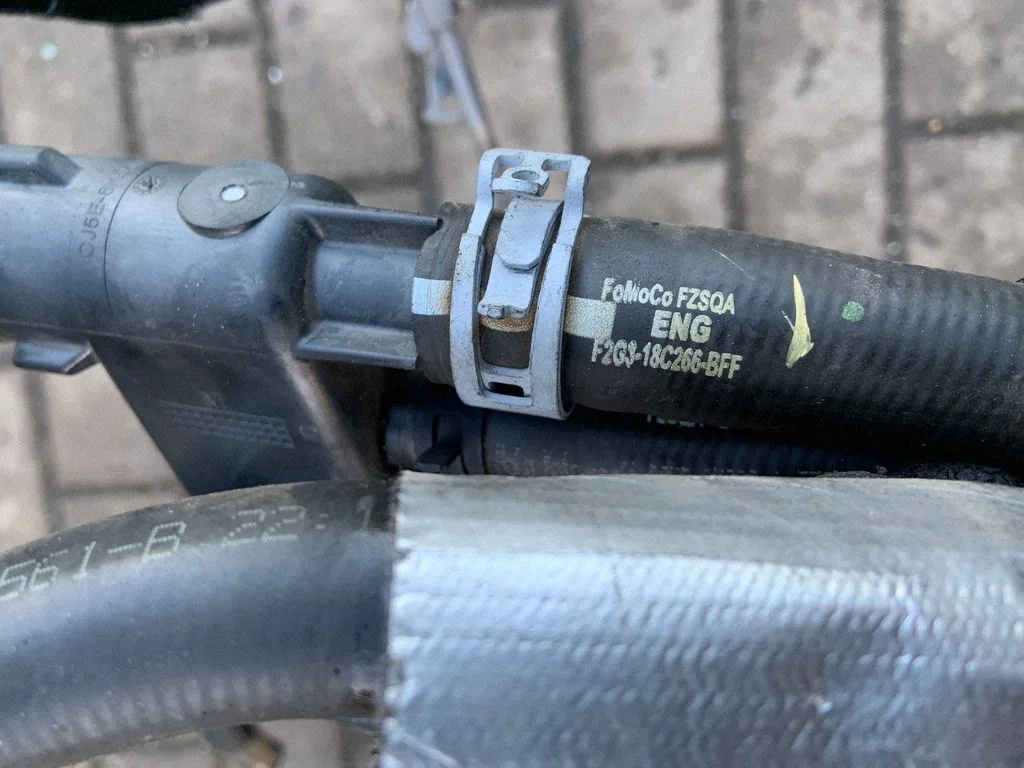 Engine coolant pipe/hose CJ5E8K556BB