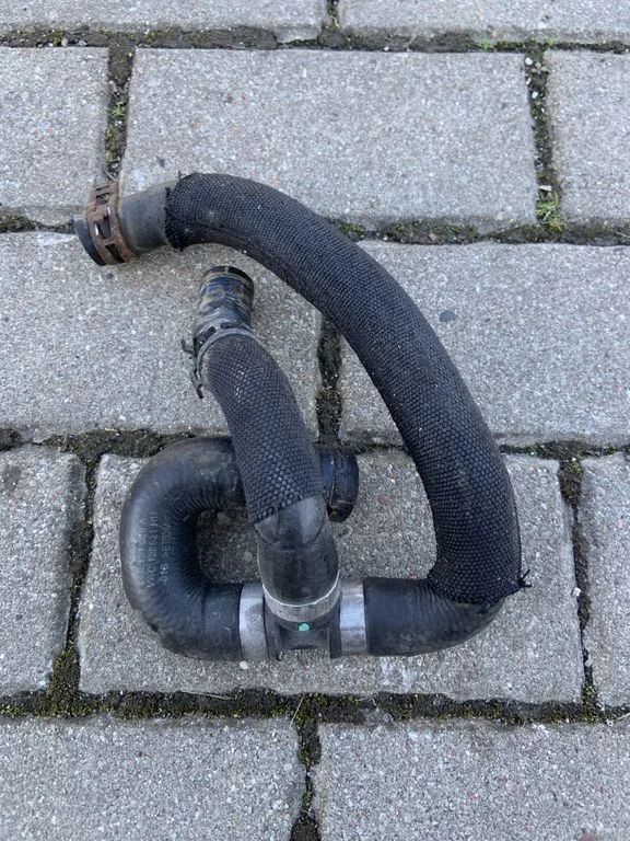 Engine coolant pipe/hose 06E121030A