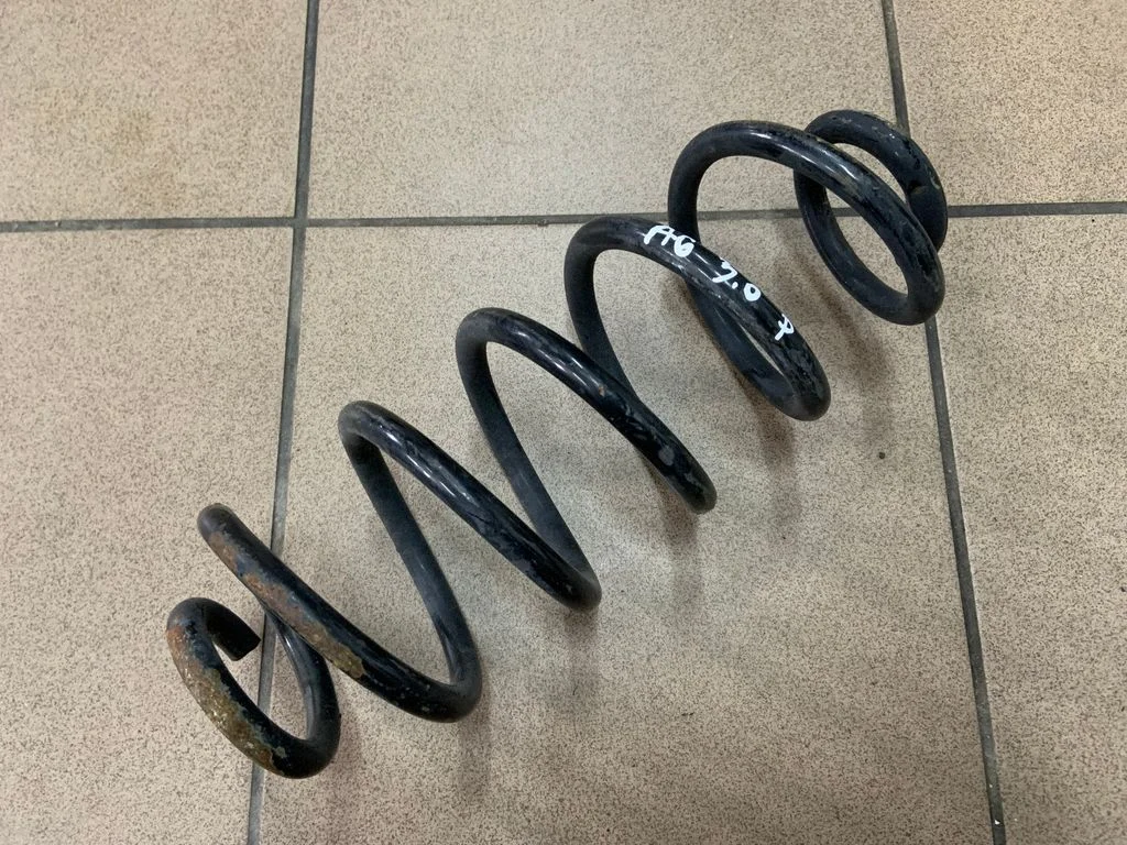 Rear coil spring – rear left