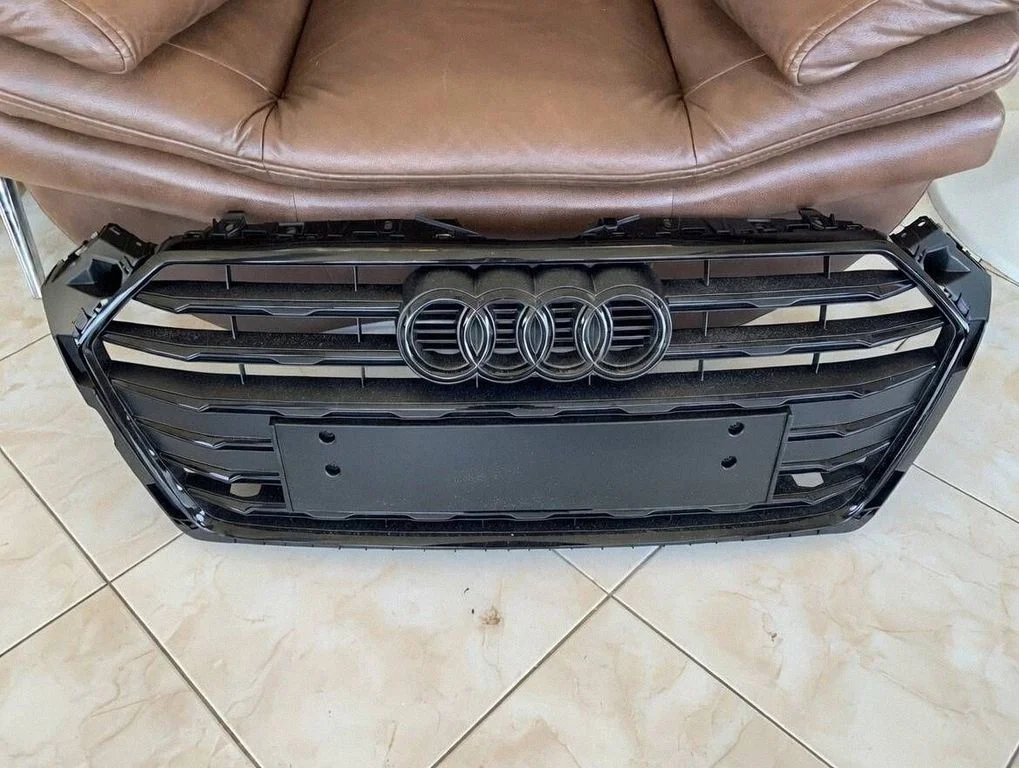 Front bumper upper radiator grill 8W6853651AB