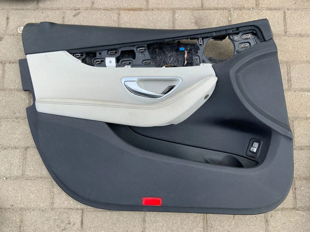 Front door card panel trim – front left
