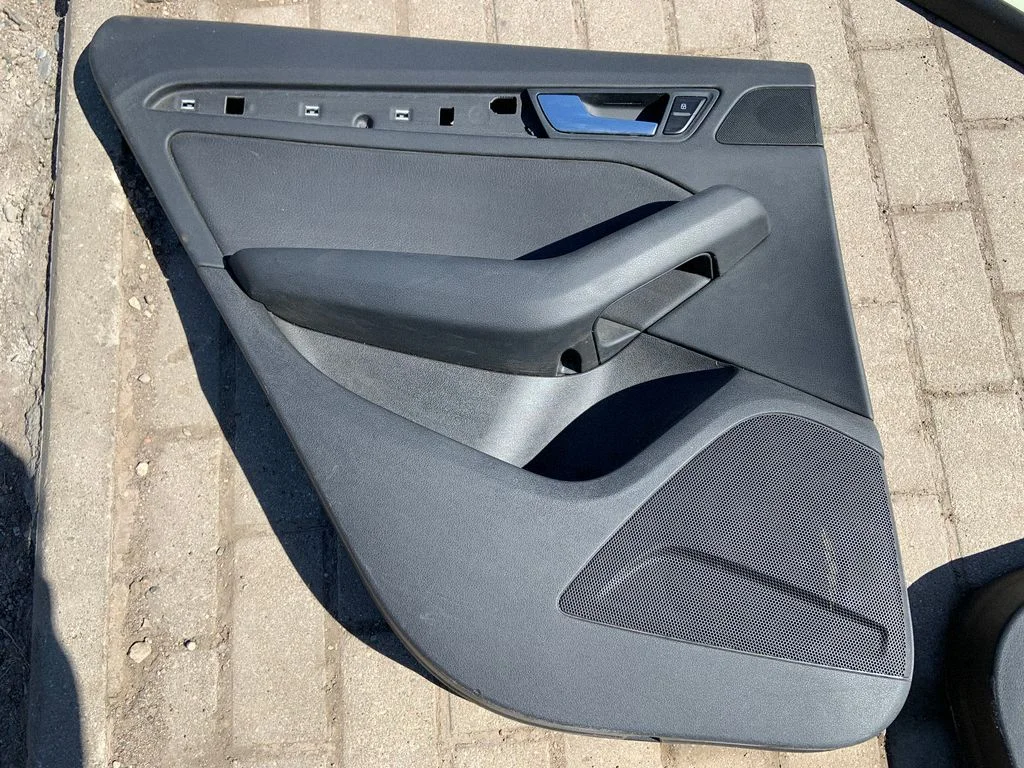 Rear door card panel trim – rear left