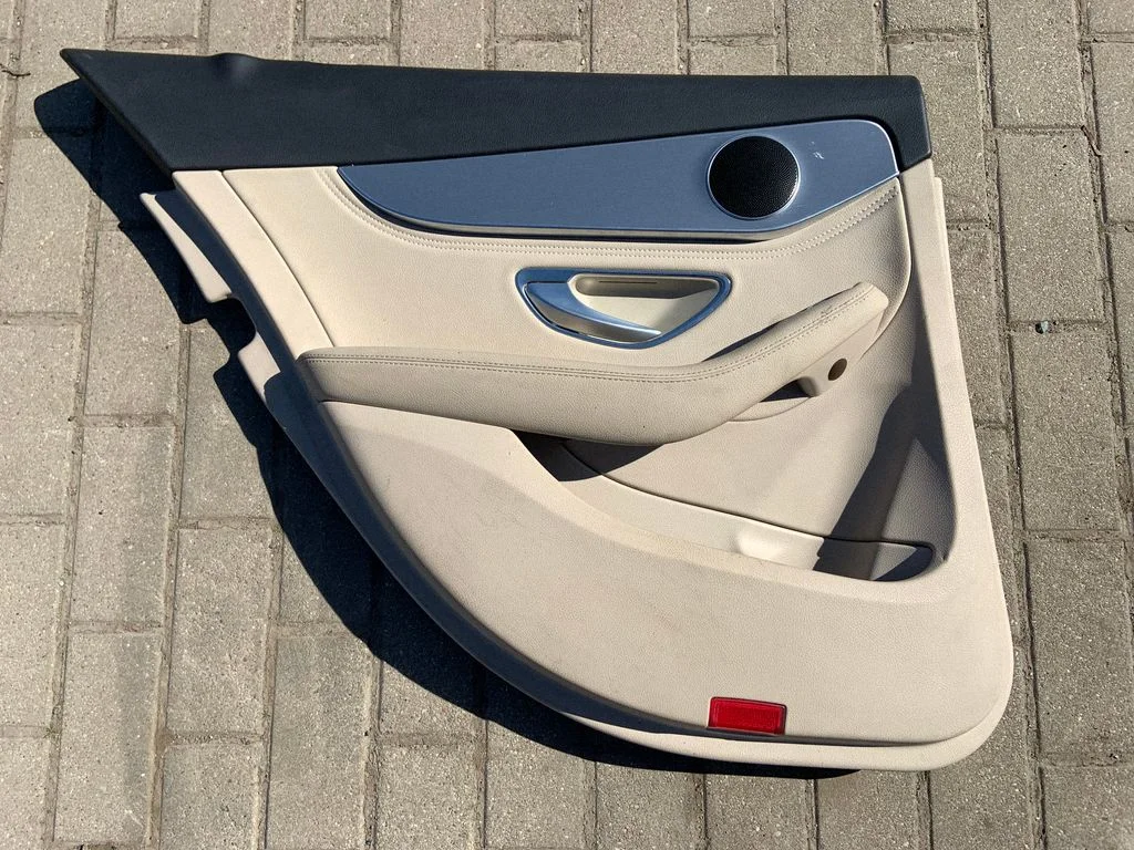 Rear door card panel trim – rear left