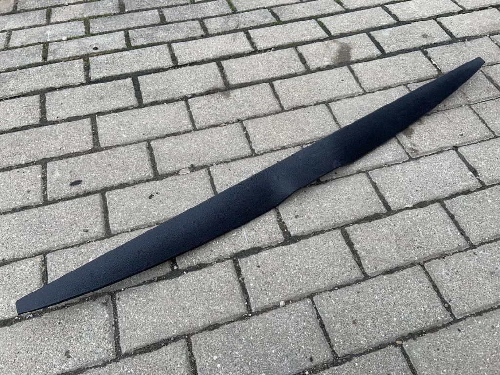 Kita bagažinės apdailos detalė