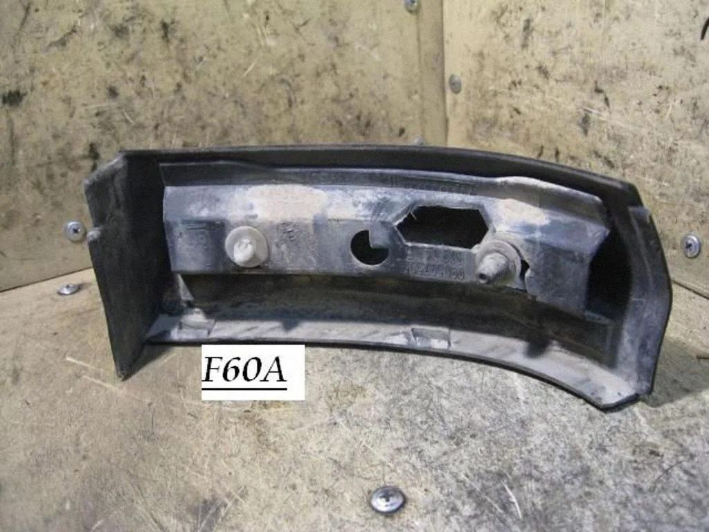 Rear/tail light trim molding – left