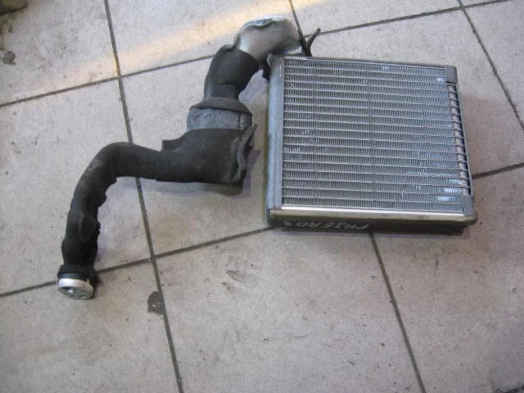 Air conditioning (A/C) radiator (interior) 03E260478