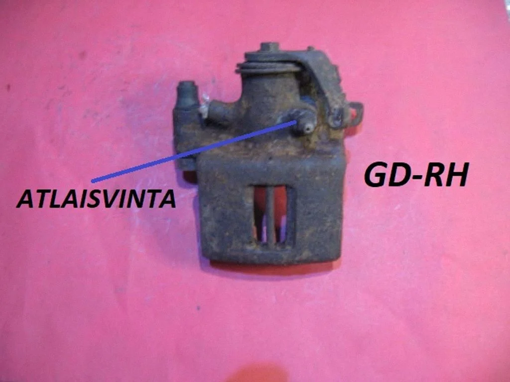 Rear brake caliper 77004884