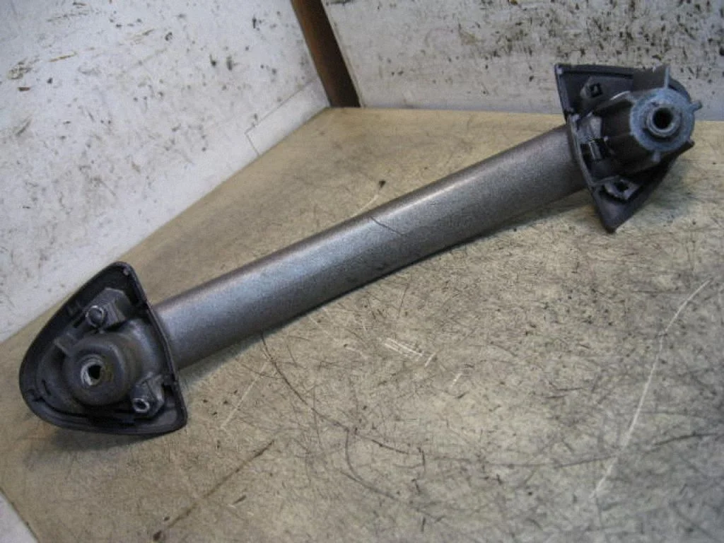 Rear door interior handle trim – left