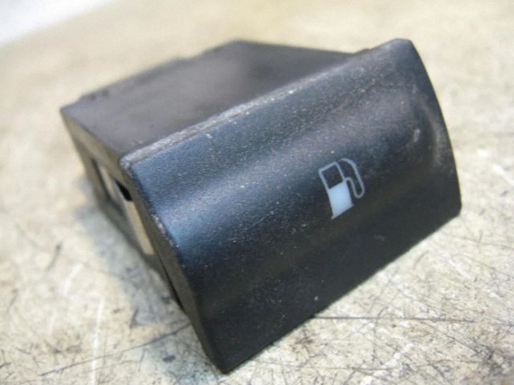 Fuel tank opening switch – left