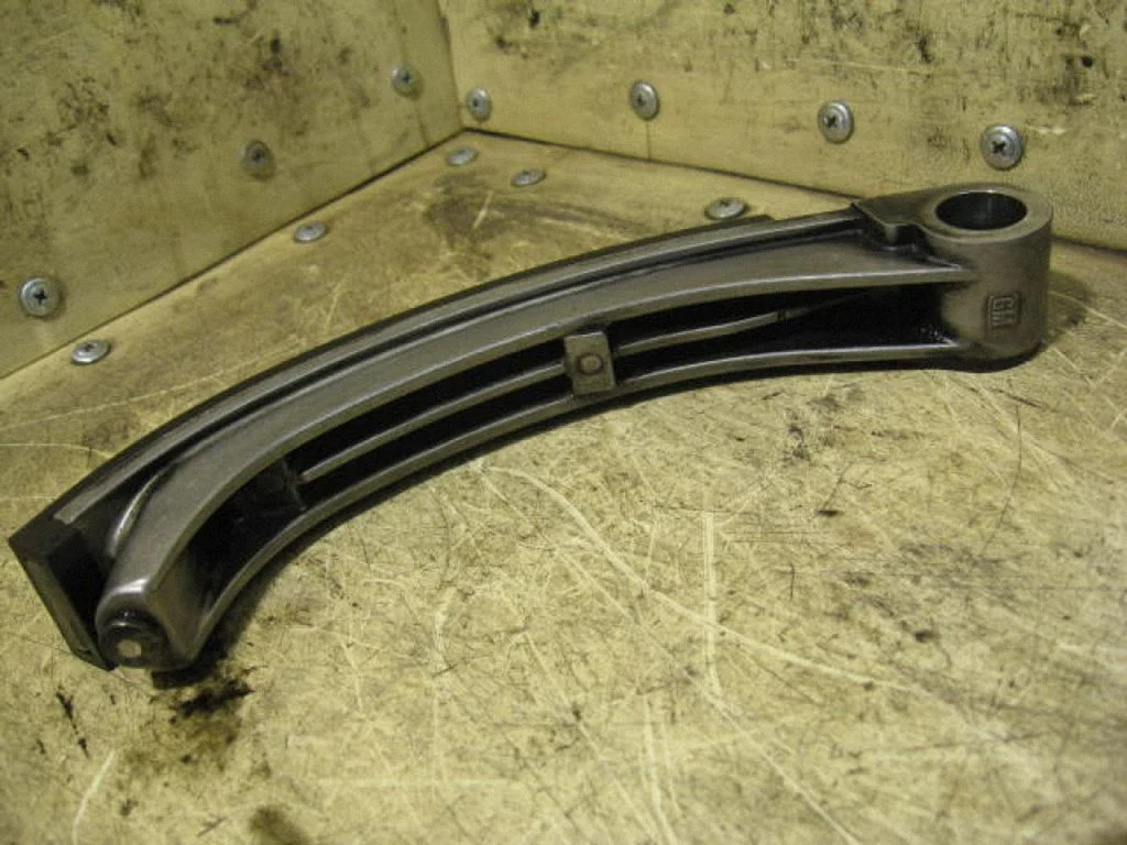 Timing belt/chain tensioner 90500768