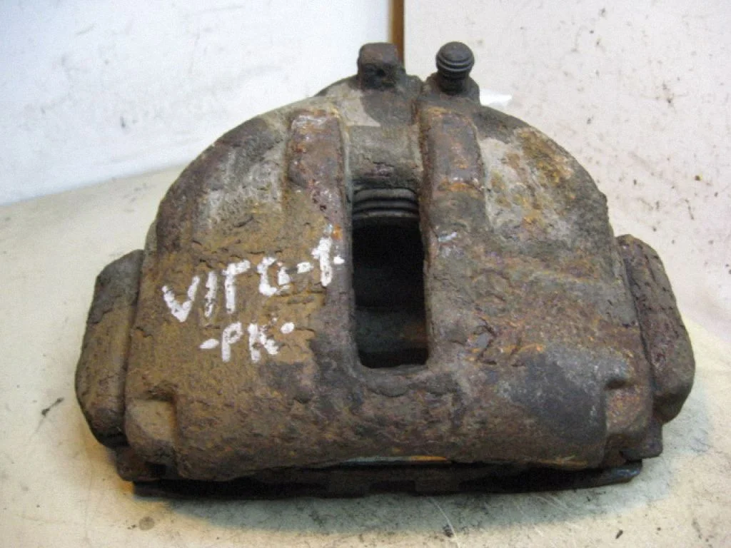 Front brake caliper – left