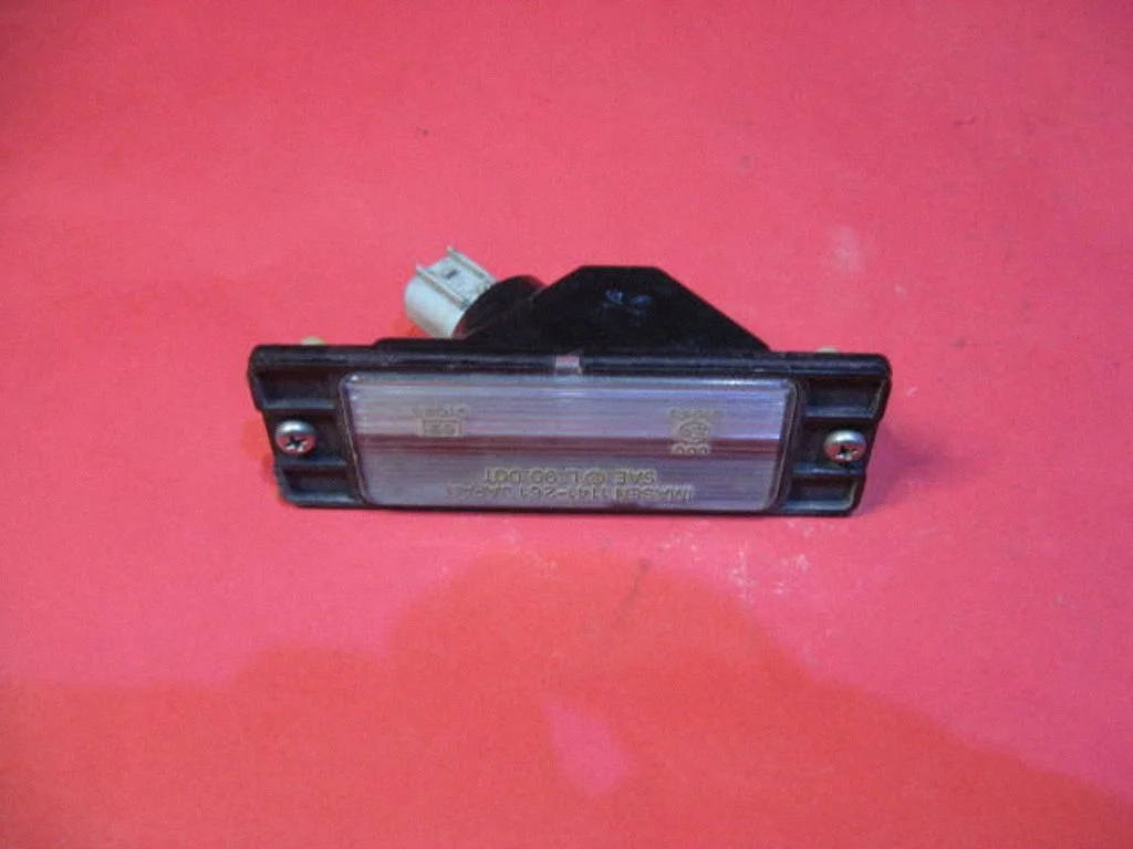 Number plate light – Mitsubishi Pajero Sport I (1996-2008)