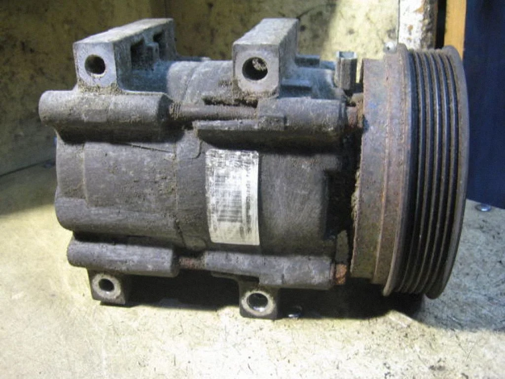 Air conditioning (A/C) compressor (pump) 97FW19D629