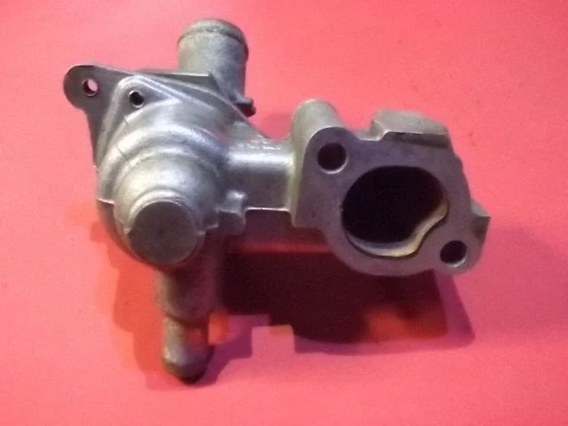 Thermostat/thermostat housing 89FF9K478