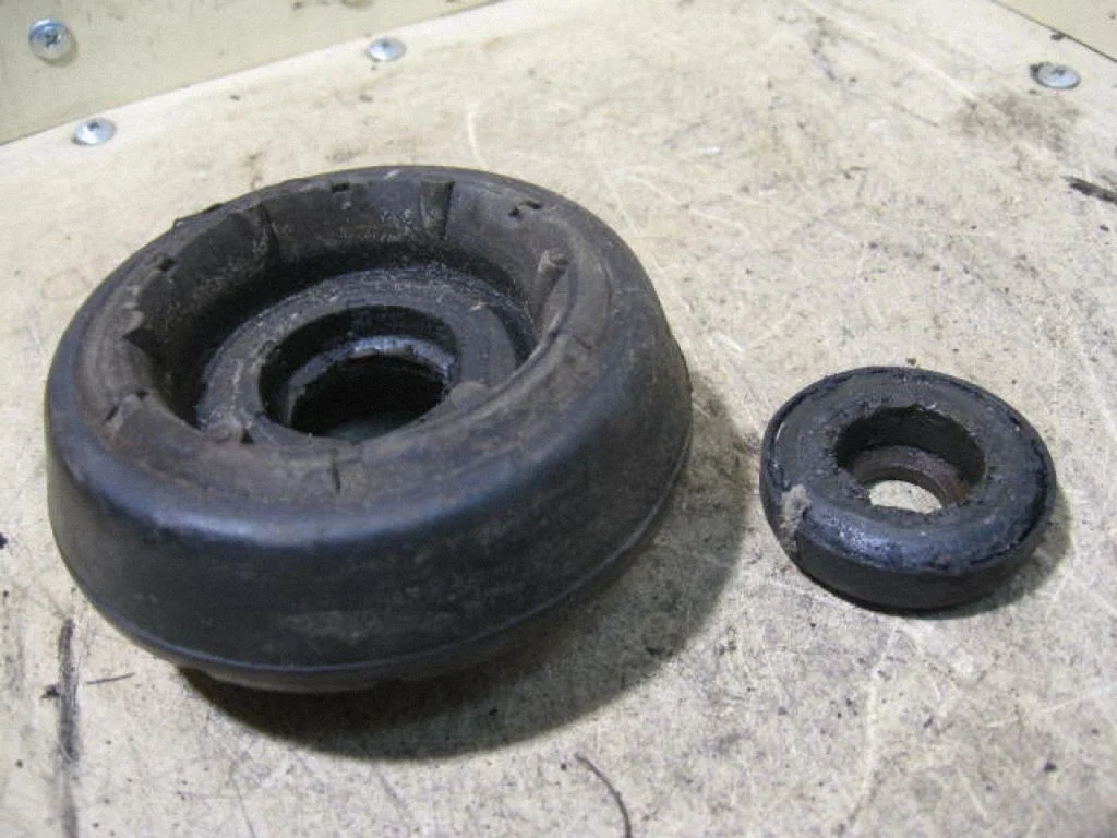 Front upper strut mount 357412331A