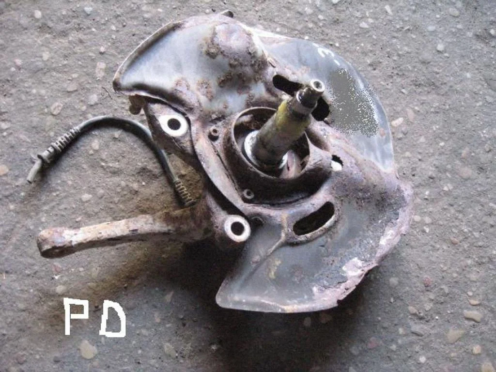 Front wheel hub spindle knuckle – right