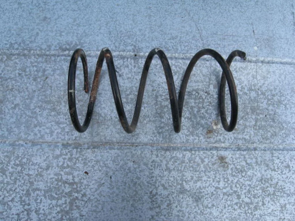 Front coil spring – Mazda 626 (1992-1997)