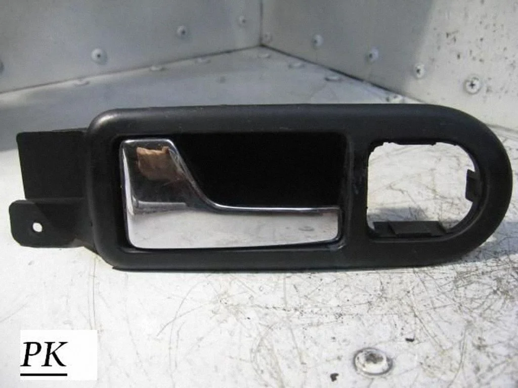 Front door interior handle – left
