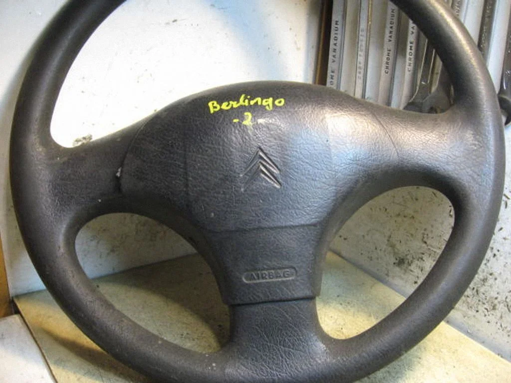 Steering wheel – front left