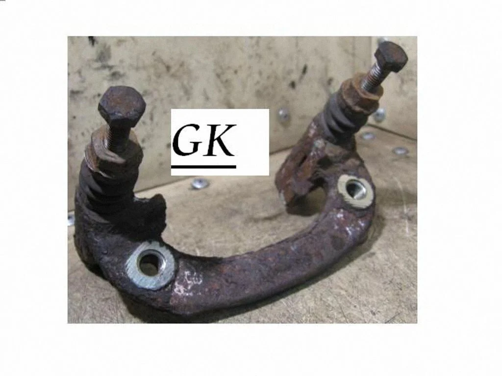 Piduriklotside hoidik/kandur (tagumine) – tagumine vasak
