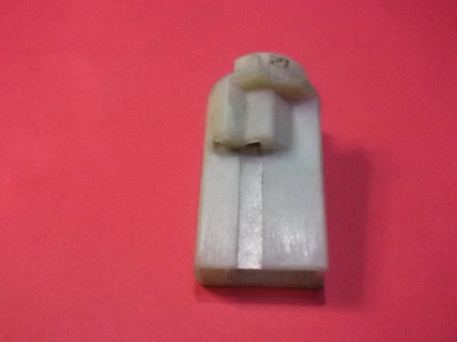 Tail light bulb cover holder 1332965