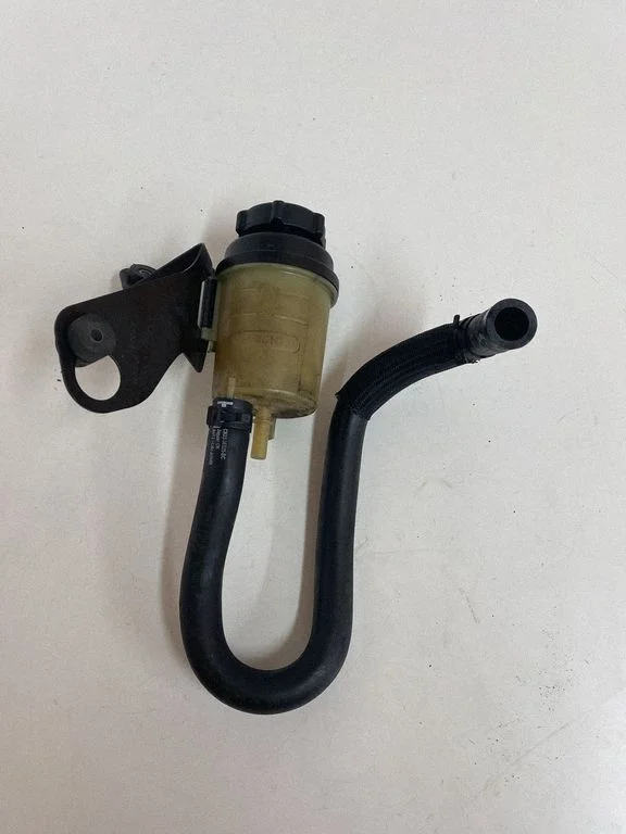Power steering fluid tank/reservoir 9X233490