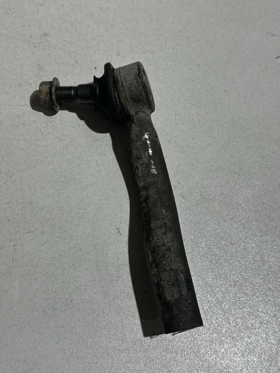 Steering tie rod end – left