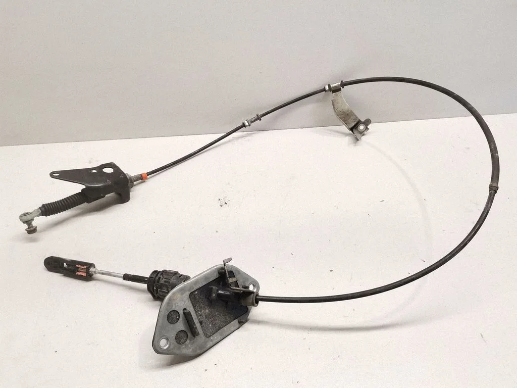 Gear shift cable linkage – front
