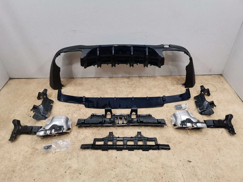 Rear bumper trim bar molding