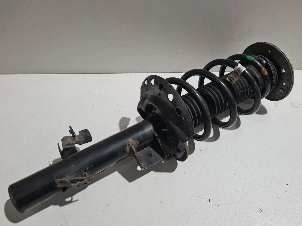 Front shock absorber with coil spring GJ3218K001AA