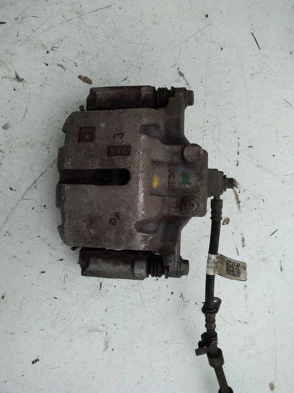 Front brake caliper 84124403