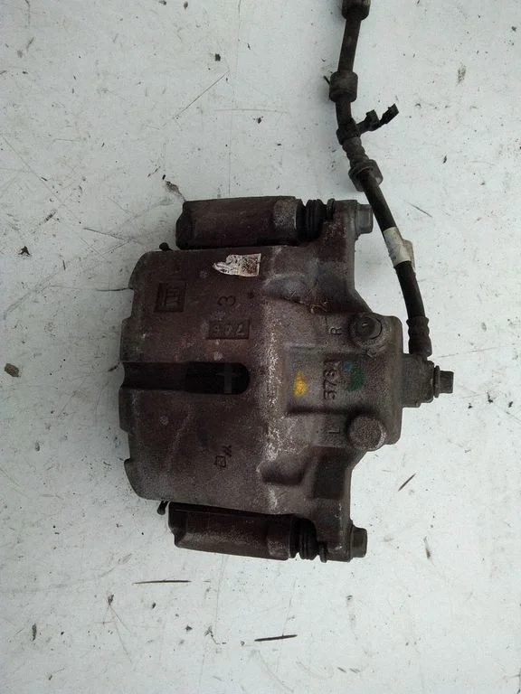 Front brake caliper 84124404
