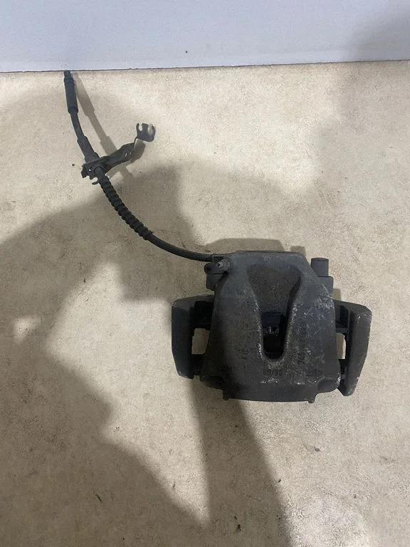 Front brake caliper 7497122