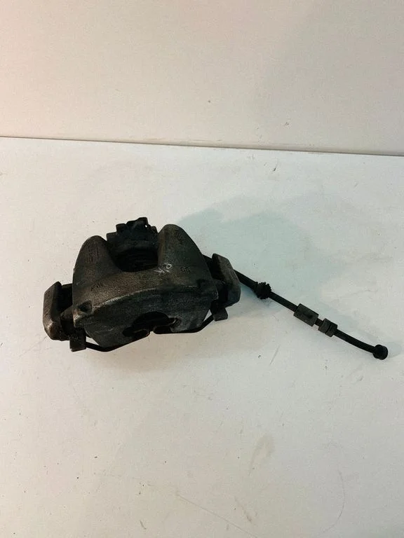 Front brake caliper A426M