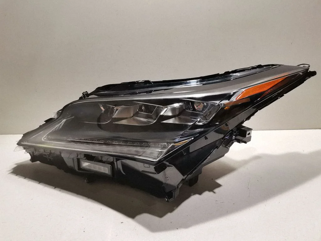 Headlight/headlamp – left