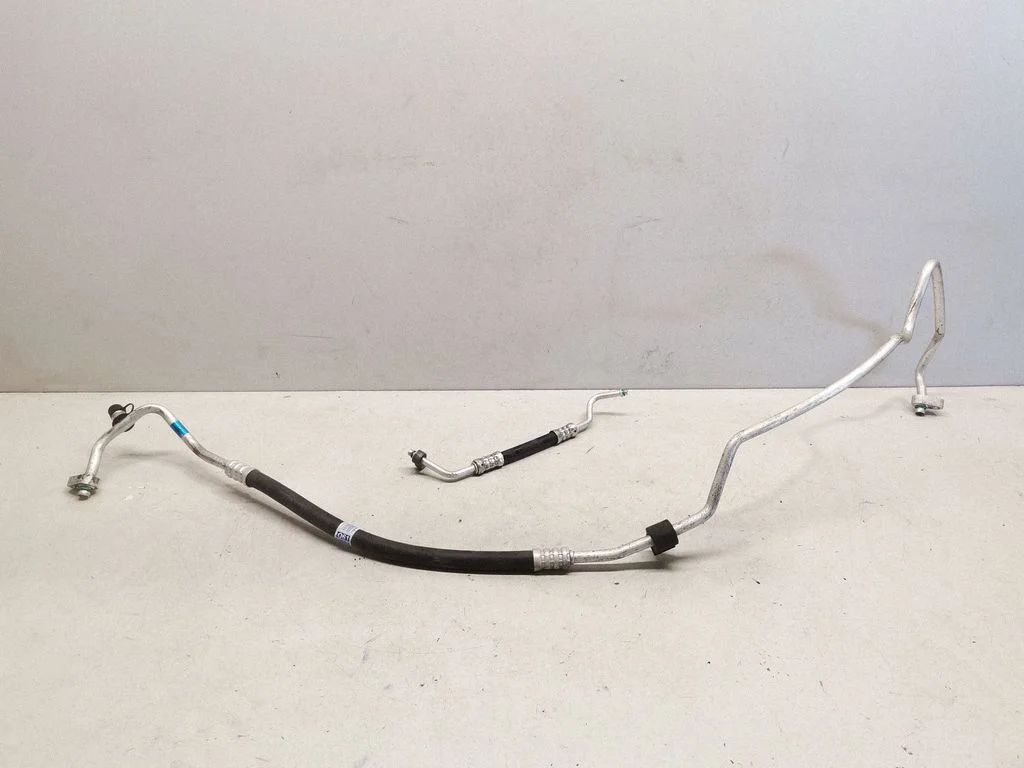 Air conditioning (A/C) pipe/hose – front
