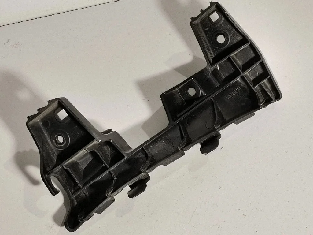 Front bumper mounting bracket 86552F1000