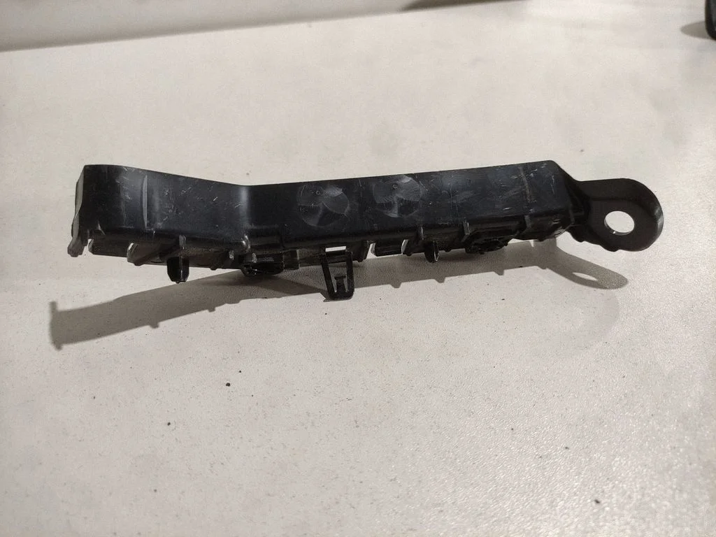 Front bumper mounting bracket J9C317A869A
