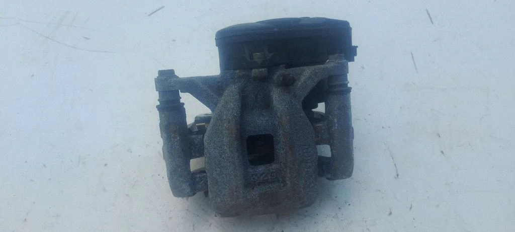 Rear brake caliper – right