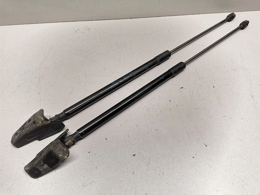 Aizmugurējā vāka amortizators BM51A406A10AE
