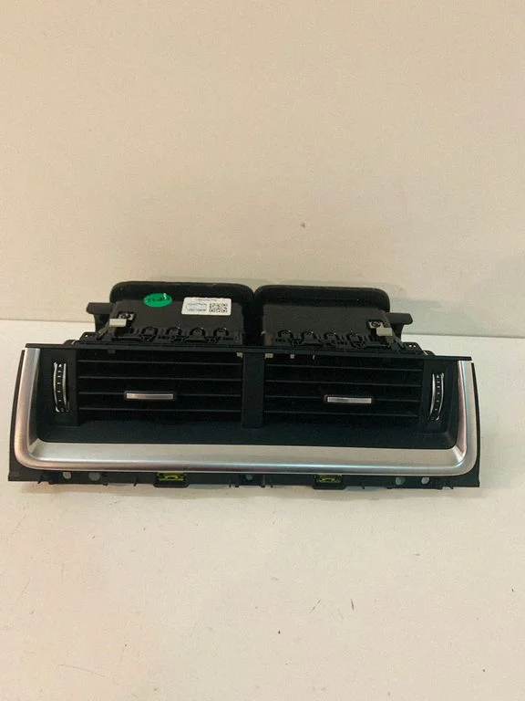 Dash center air vent grill J9C3014L21AD