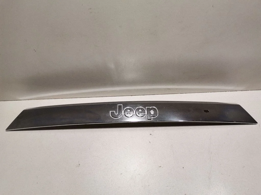 Kita bagažinės apdailos detalė